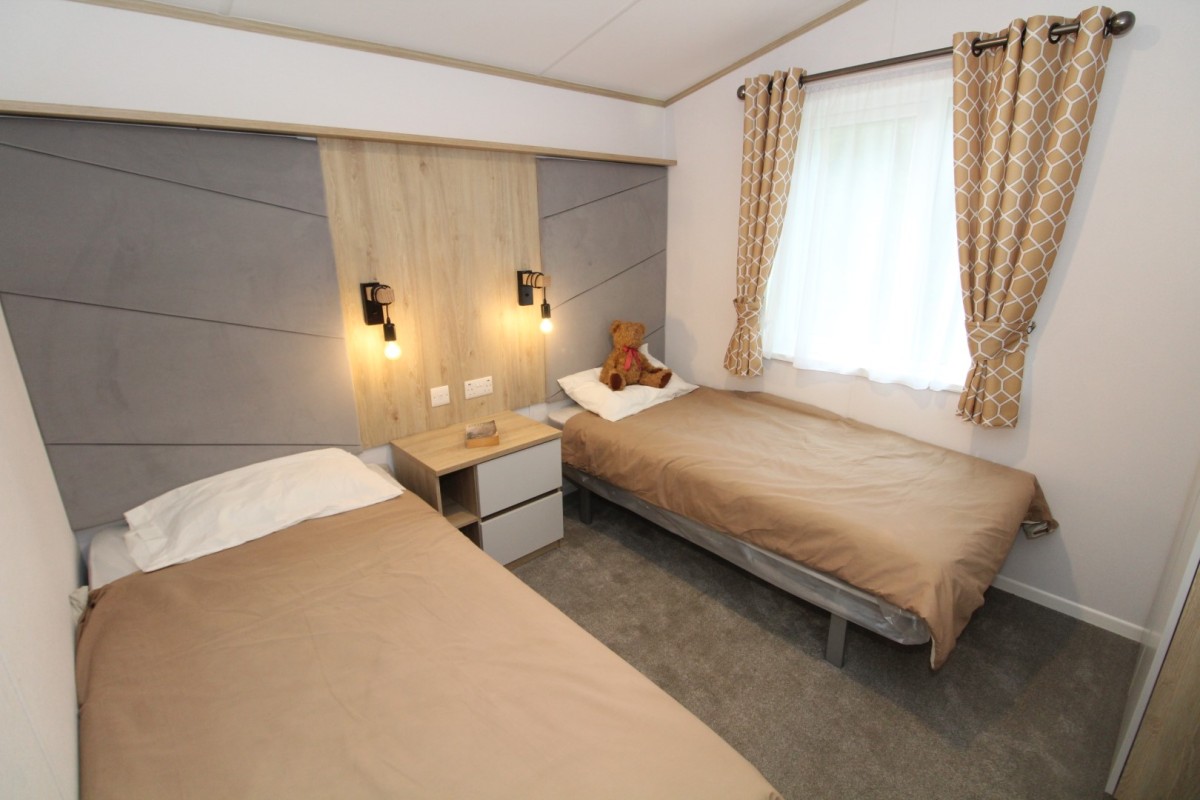 2023 Atlas Oakwood Lodgelarge twin bedroom