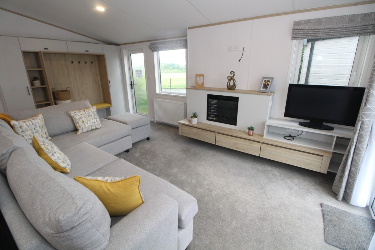 lounge to dining area in the 2023 Atlas Oakwood Lodge 