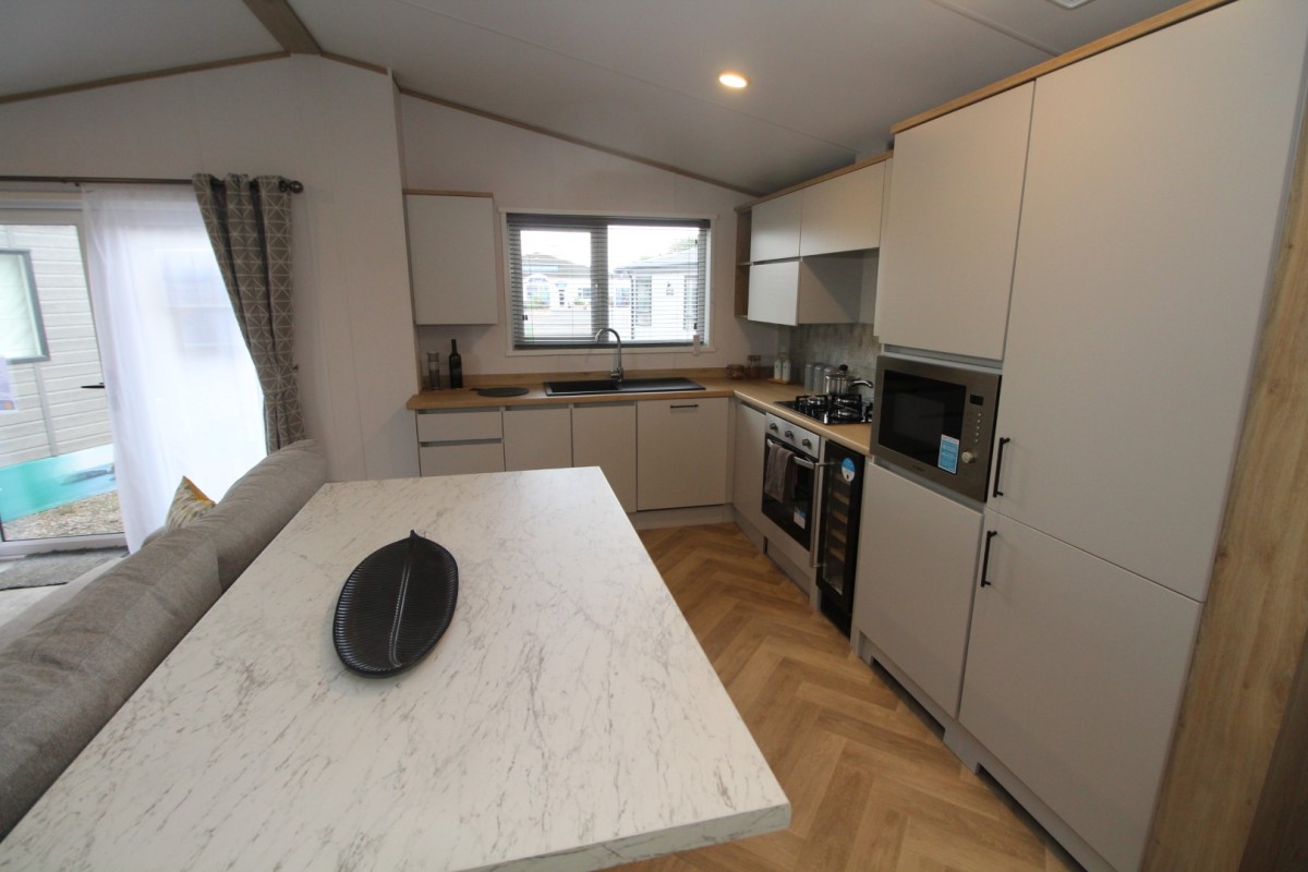 2023 Atlas Oakwood Lodge  dining area to kitchen