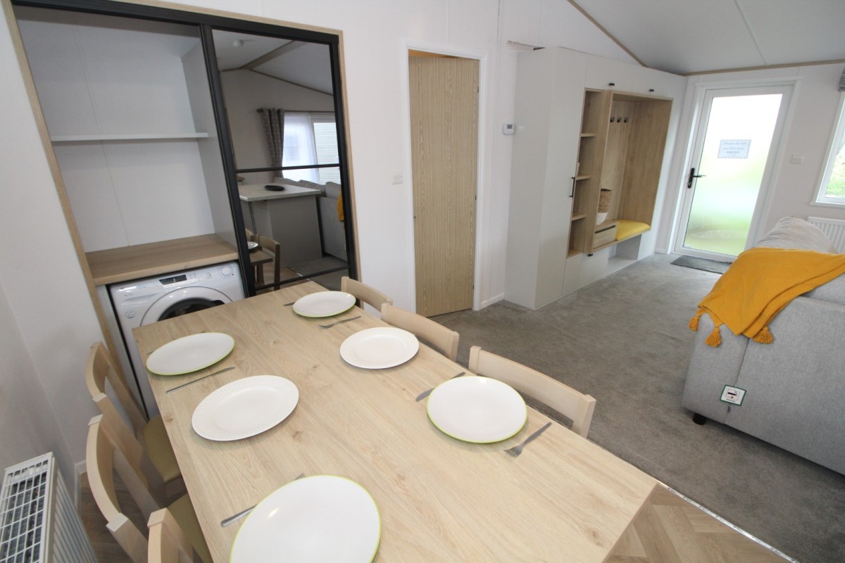 2023 Atlas Oakwood Lodge  dining area to utility room