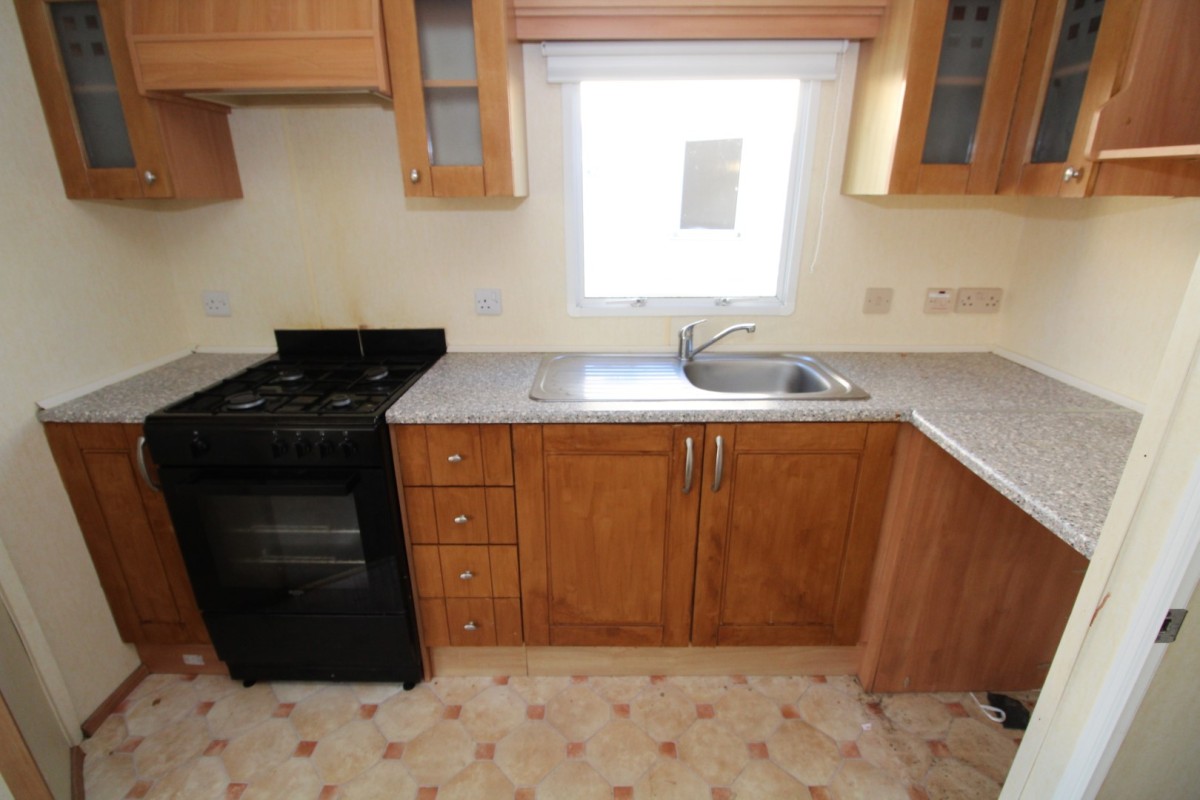 cooker and sink in the kitchen