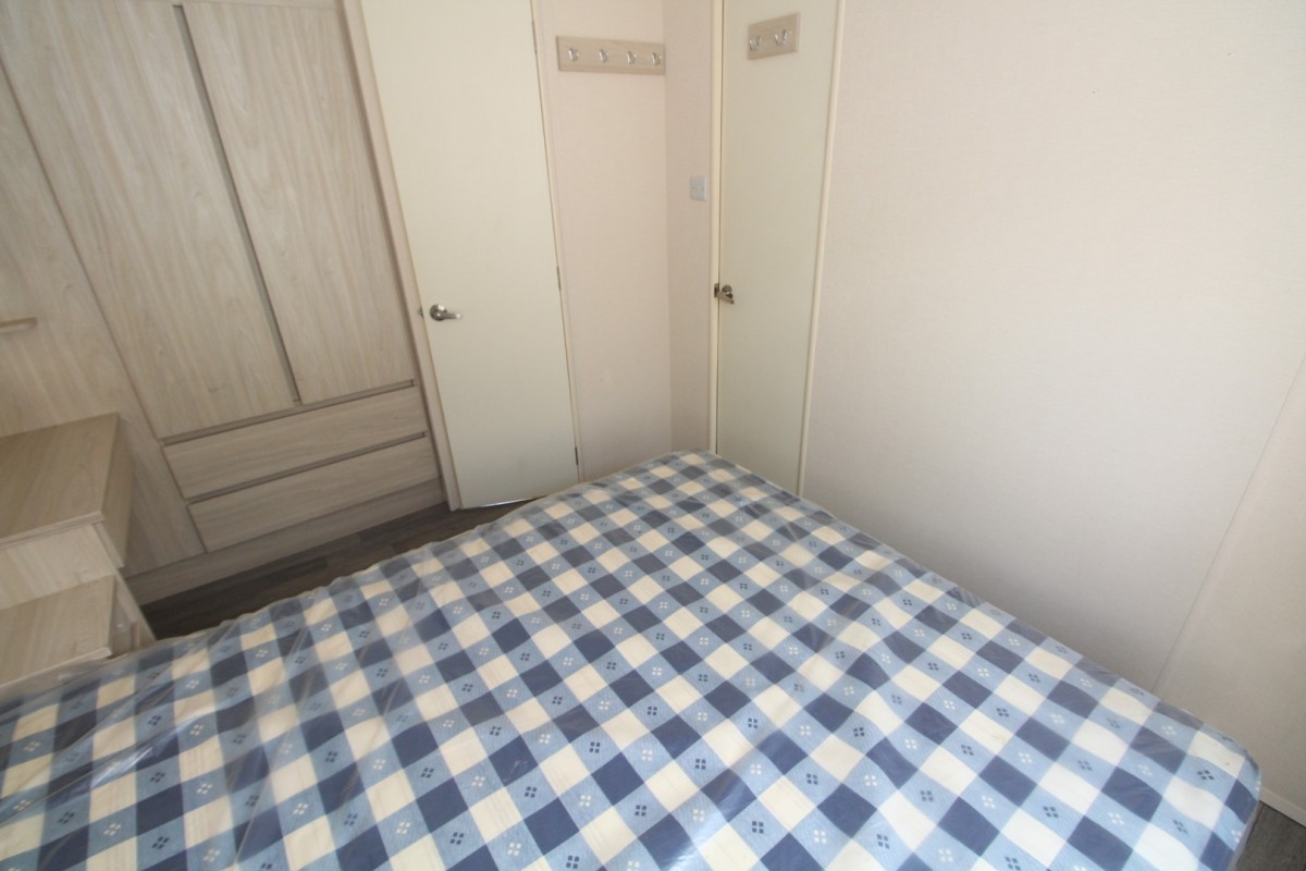 double bedroom with wardrobe space