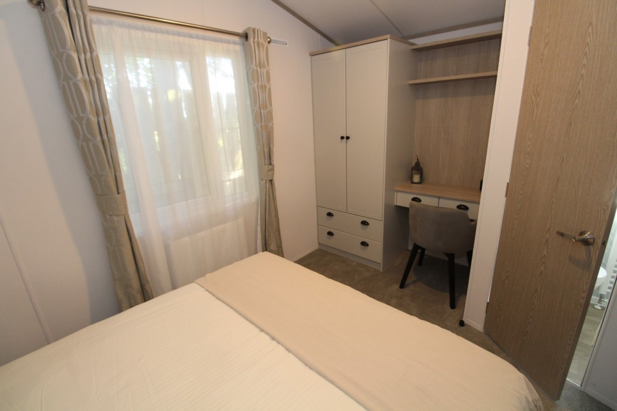 double bedroom with dressing table in the 2024 Atlas Sherwood Lodge