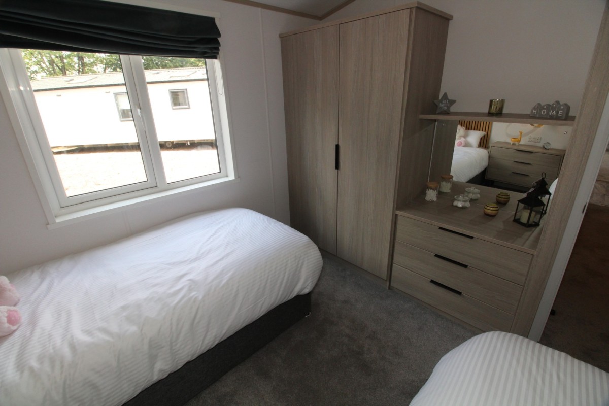 second view of twin bedroom