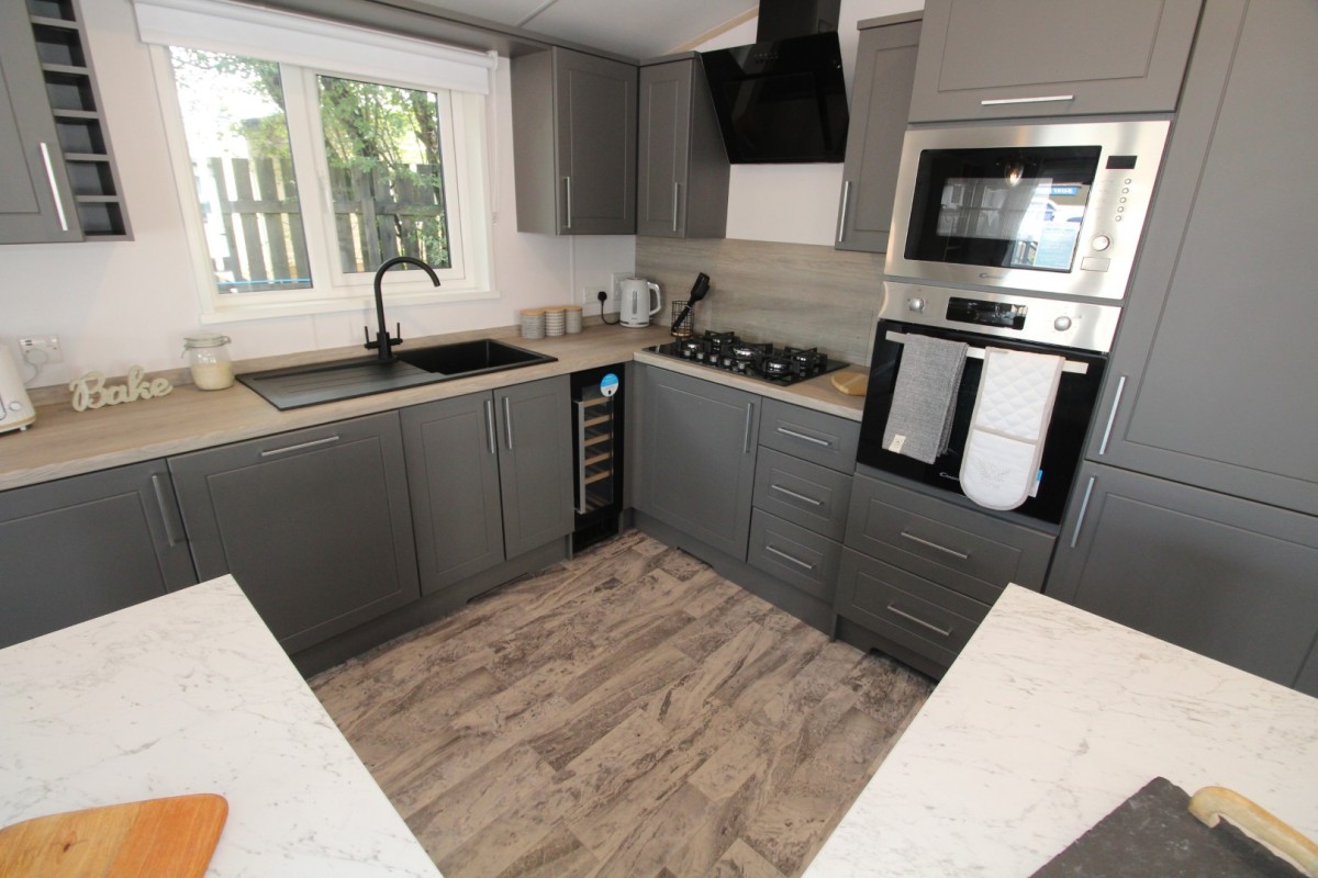 modern kitchen in the 2023 Atlas Lilac Lodge