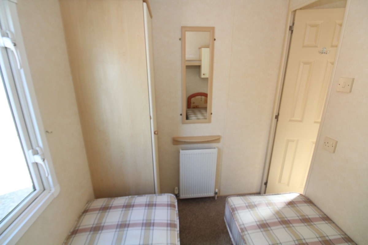 second view of twin bedroom