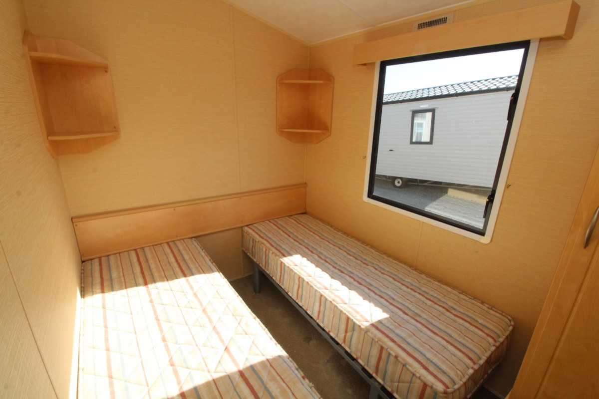 twin beds with window