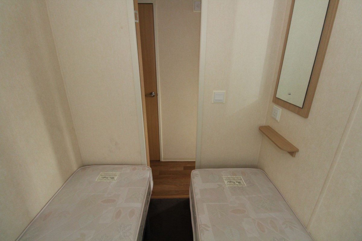 second view of twin bedroom