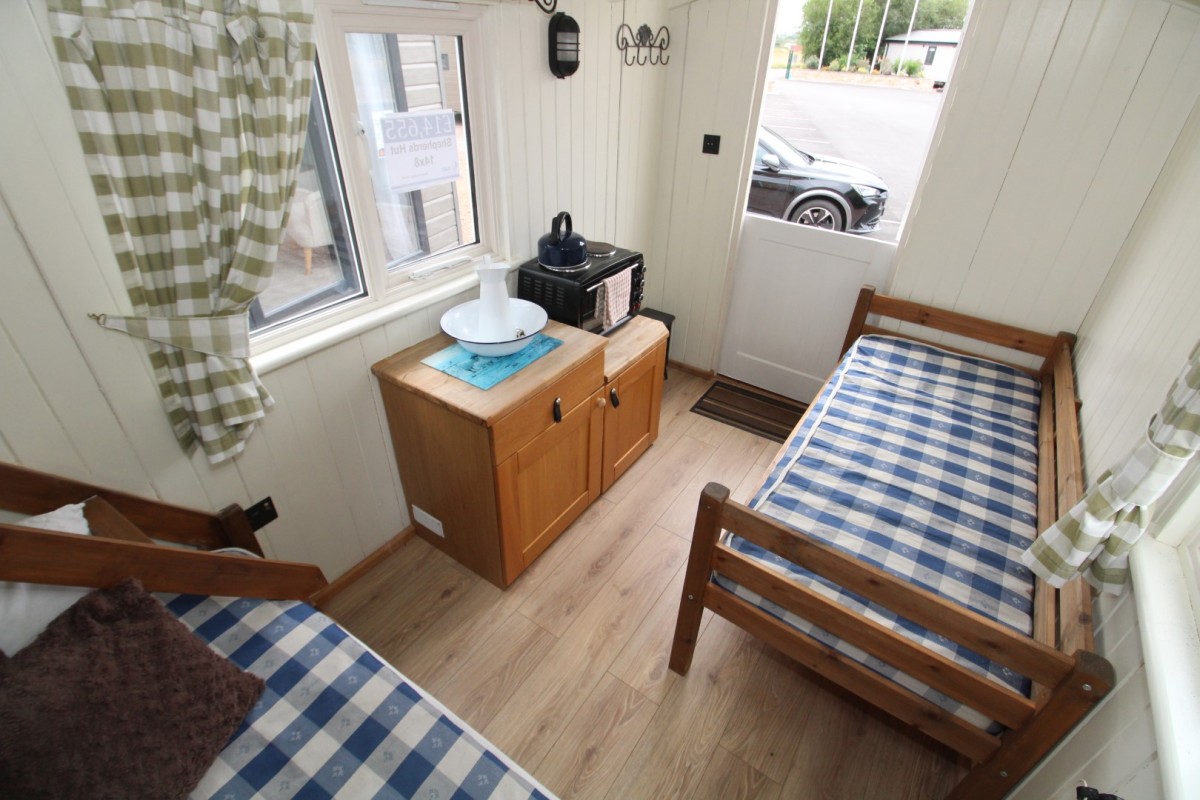 Shepherds Hut with bed and table