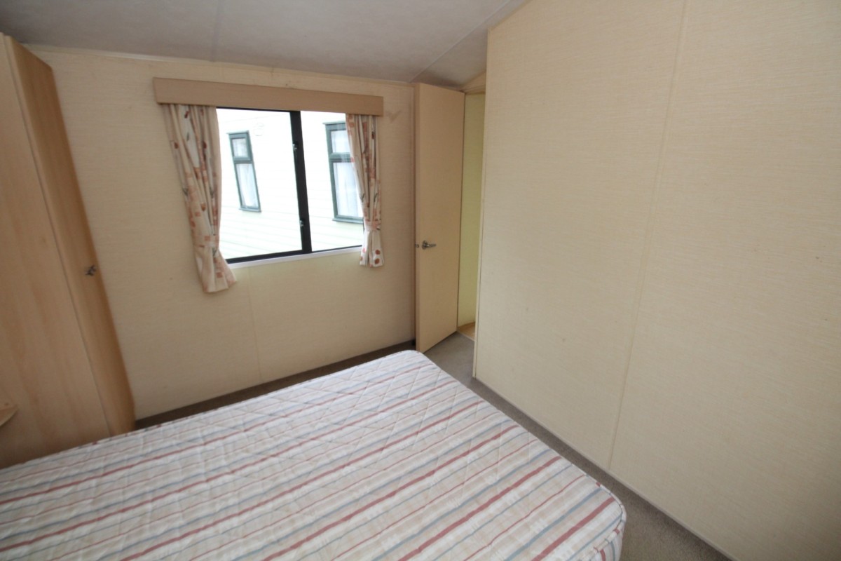 double bedroom with window in the 2011 Willerby Herald Gold