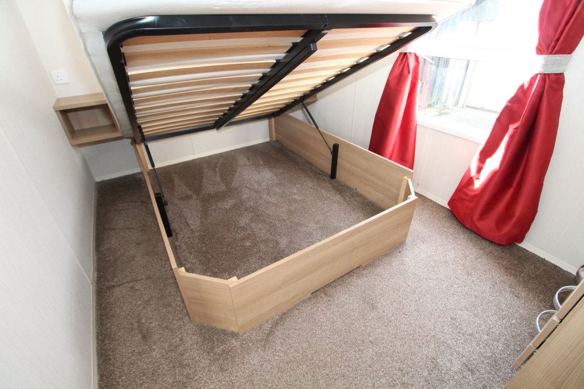 Lift up storage bed in main bedroom