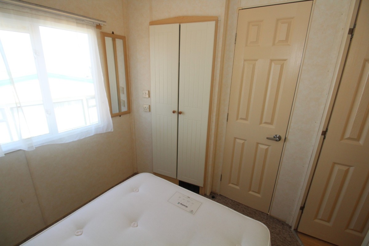 double bedroom with wardrobes