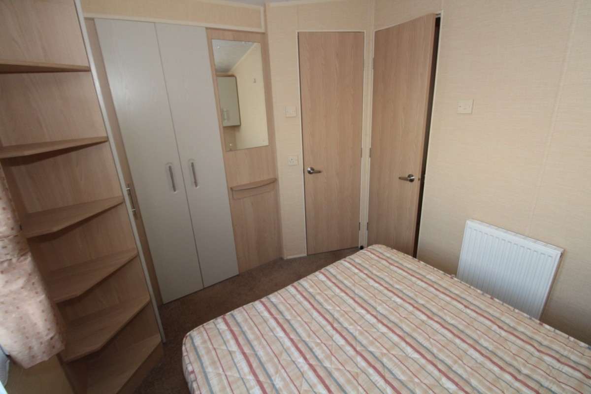 double bedroom with wardrobes