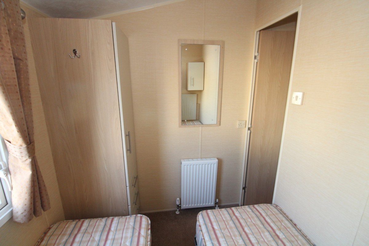 second view of twin bedroom