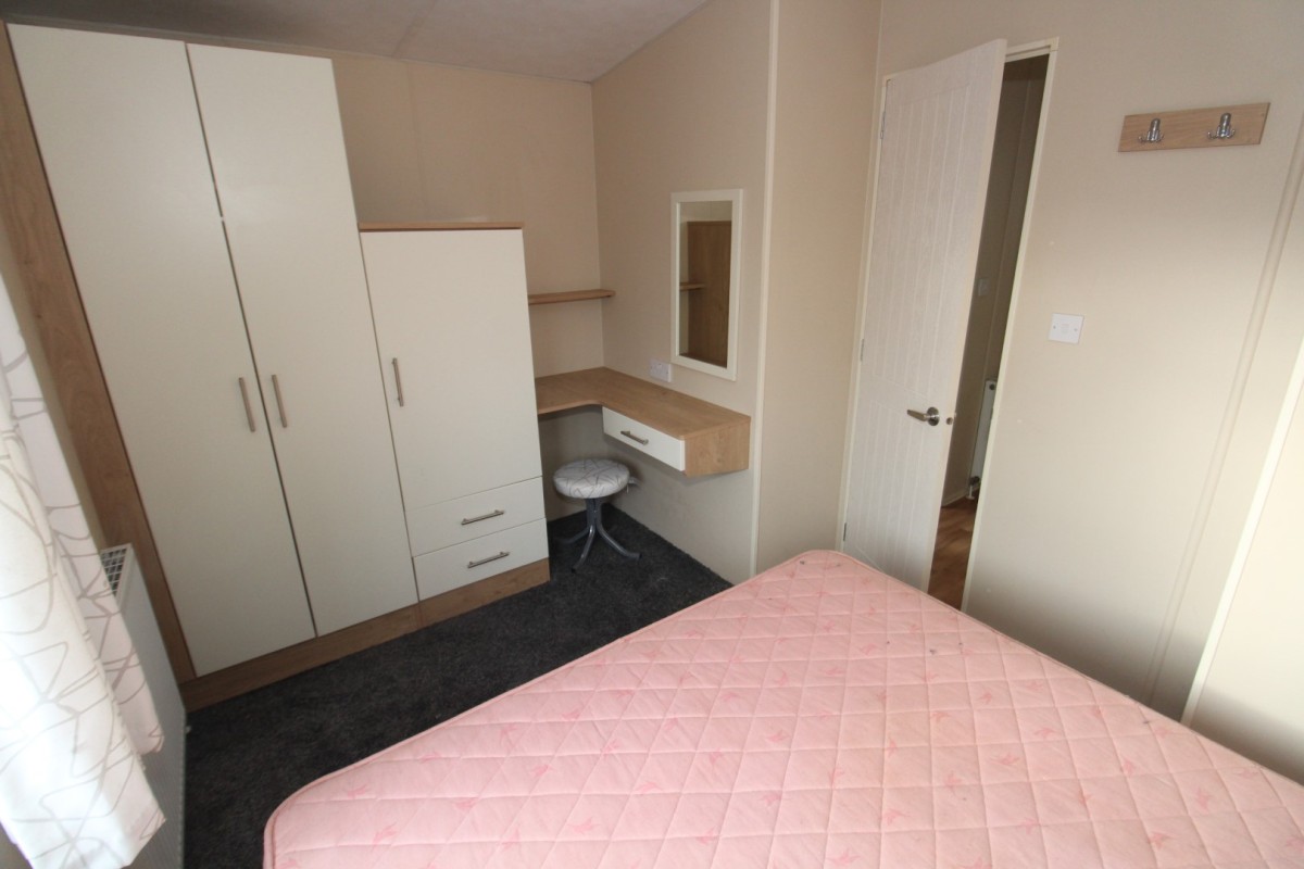 third view of double bedroom