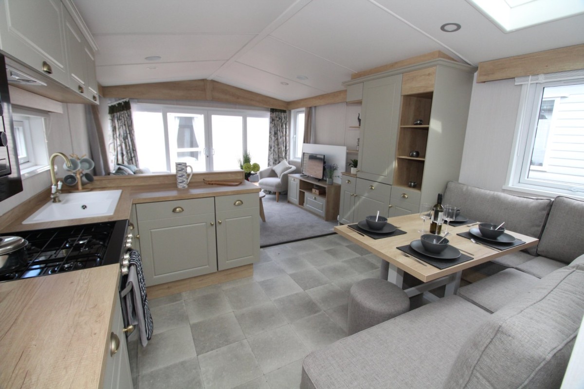dining area to lounge in the 2023 Swift Moselle Lodge 
