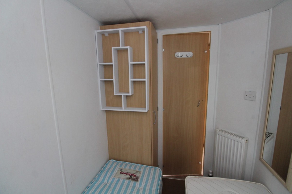 twin beds with wardrobe