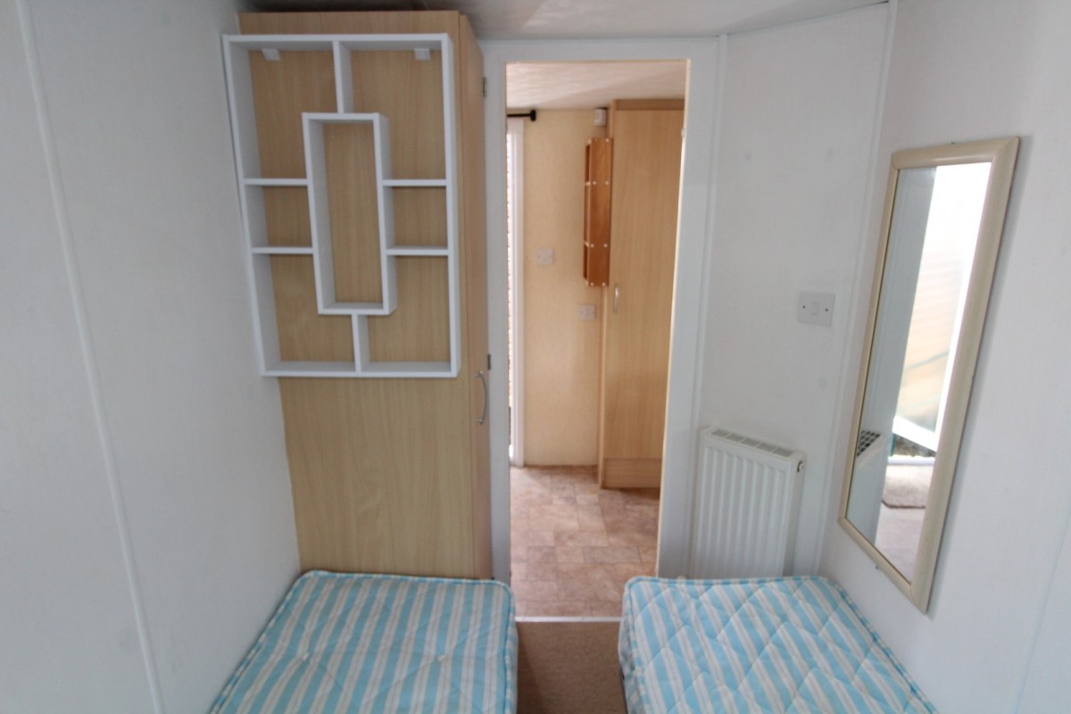 twin beds with wardrobe