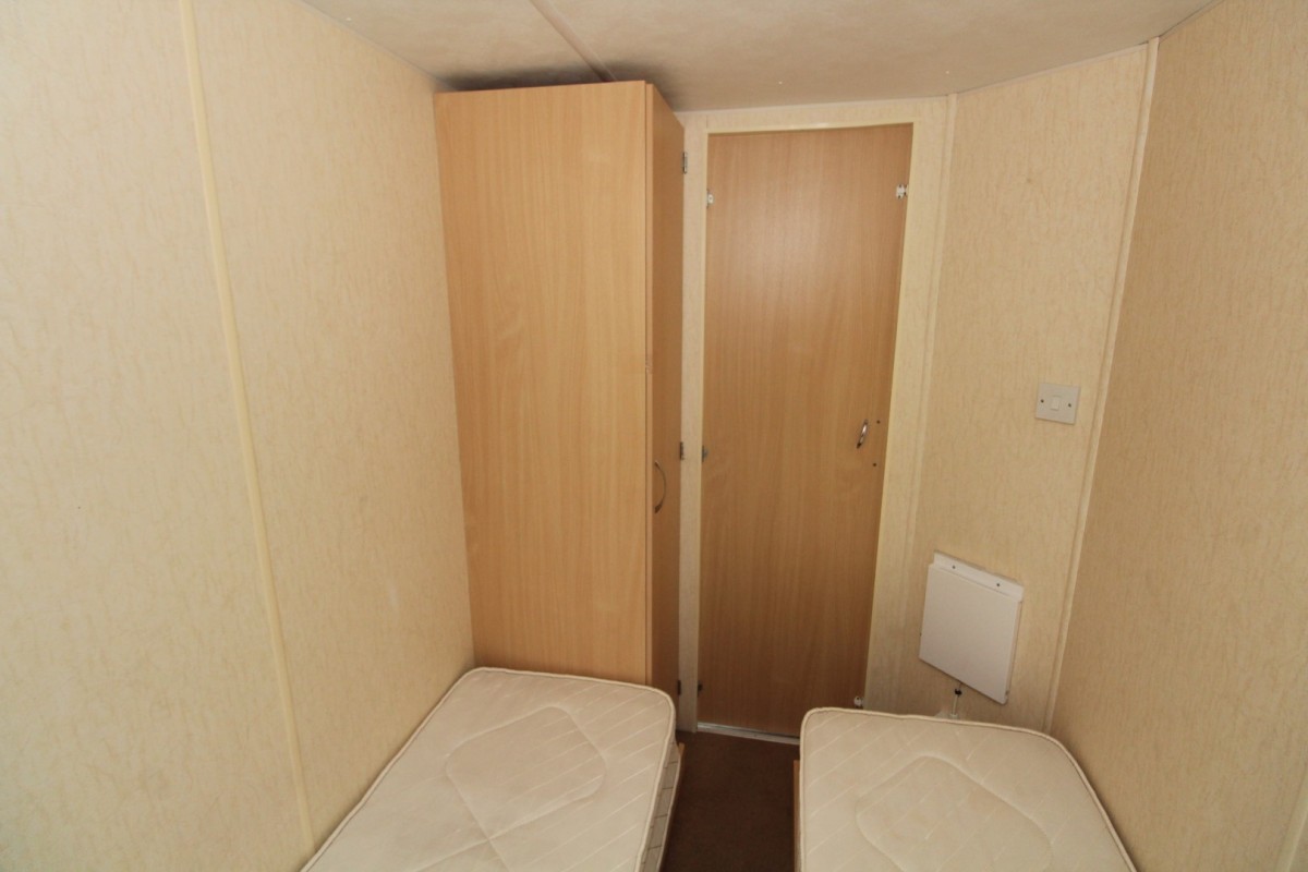 third bedroom with wardrobes