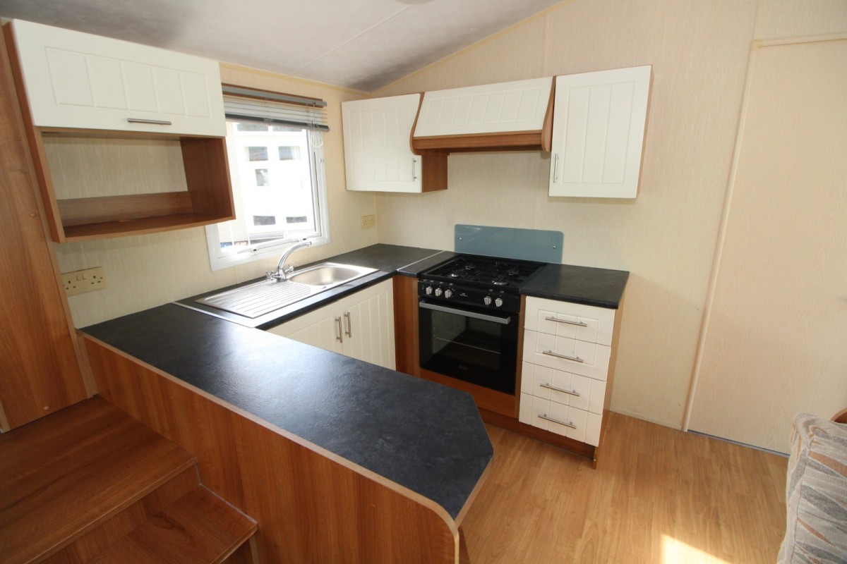 modern kitchen with oven and sink