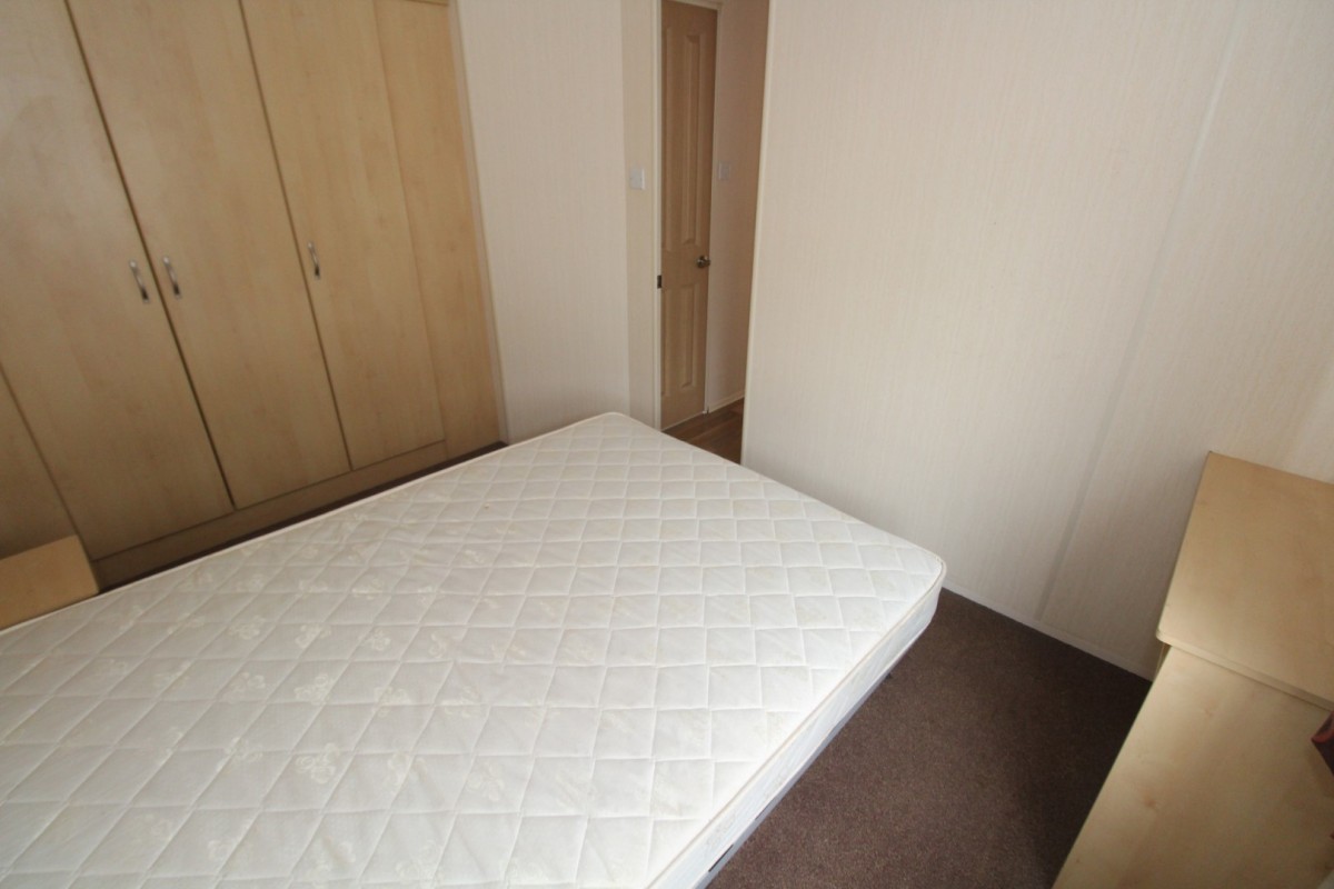 third view of the double bedroom