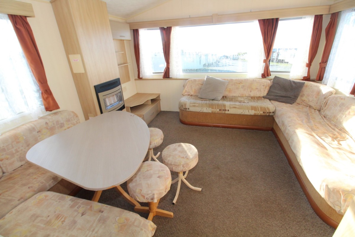 2011 Willerby Rio Gold dining area to lounge