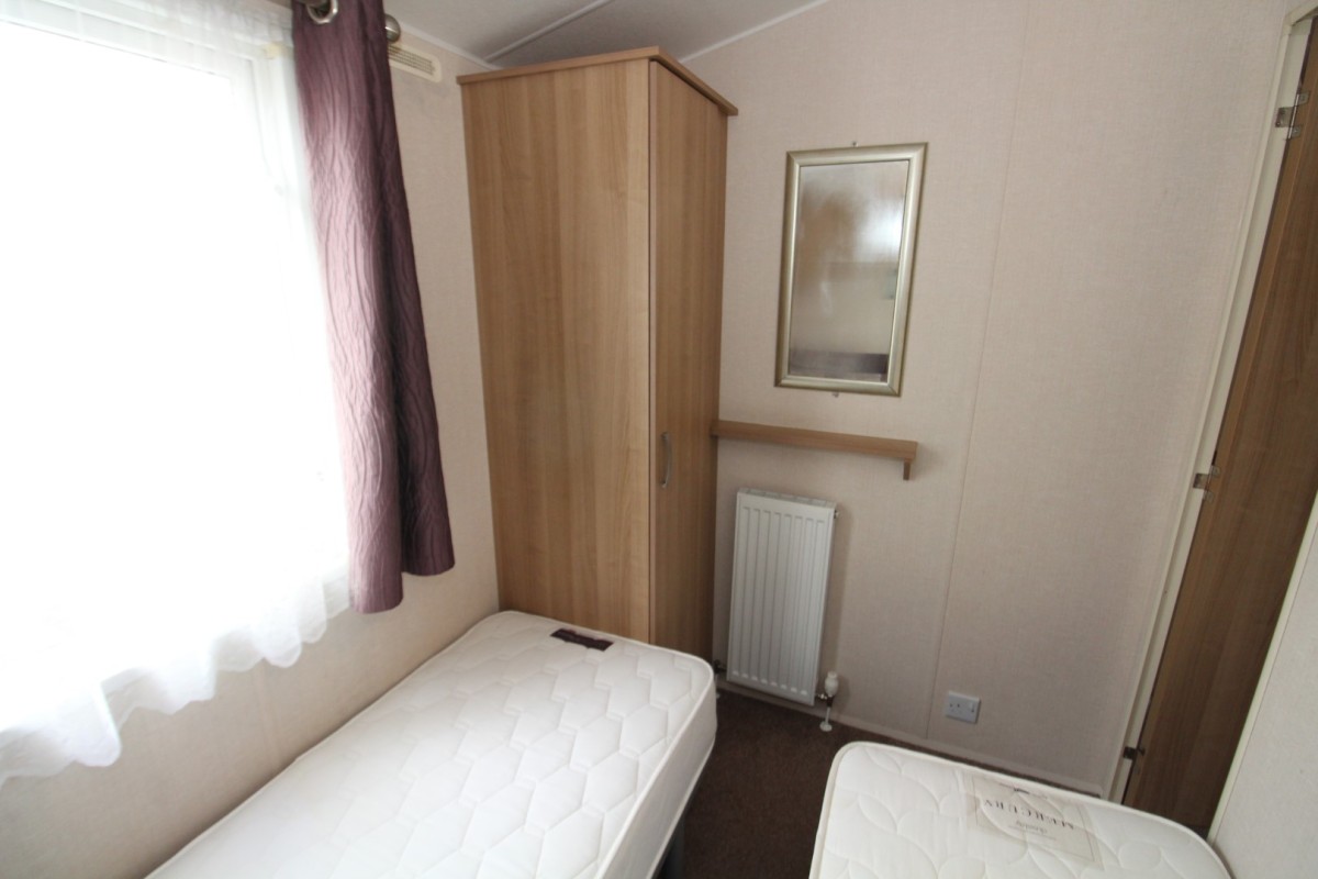 twin beds with wardrobe