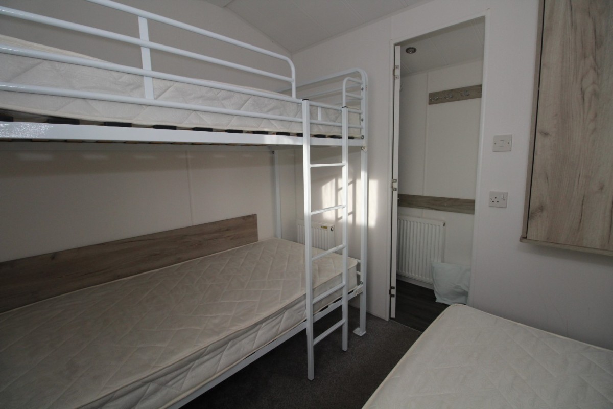 second view of the triple bedroom