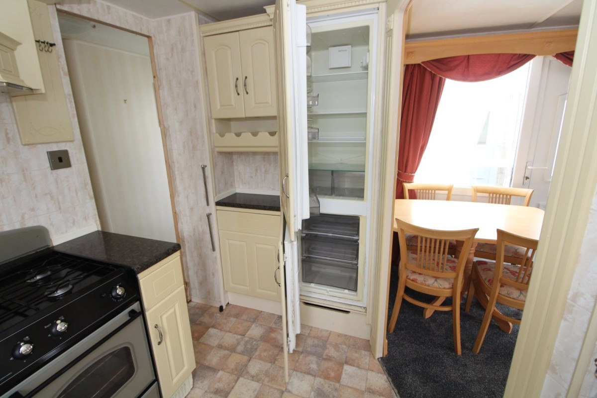 2004 Atlas Oakwood kitchen with full size fridge freezer