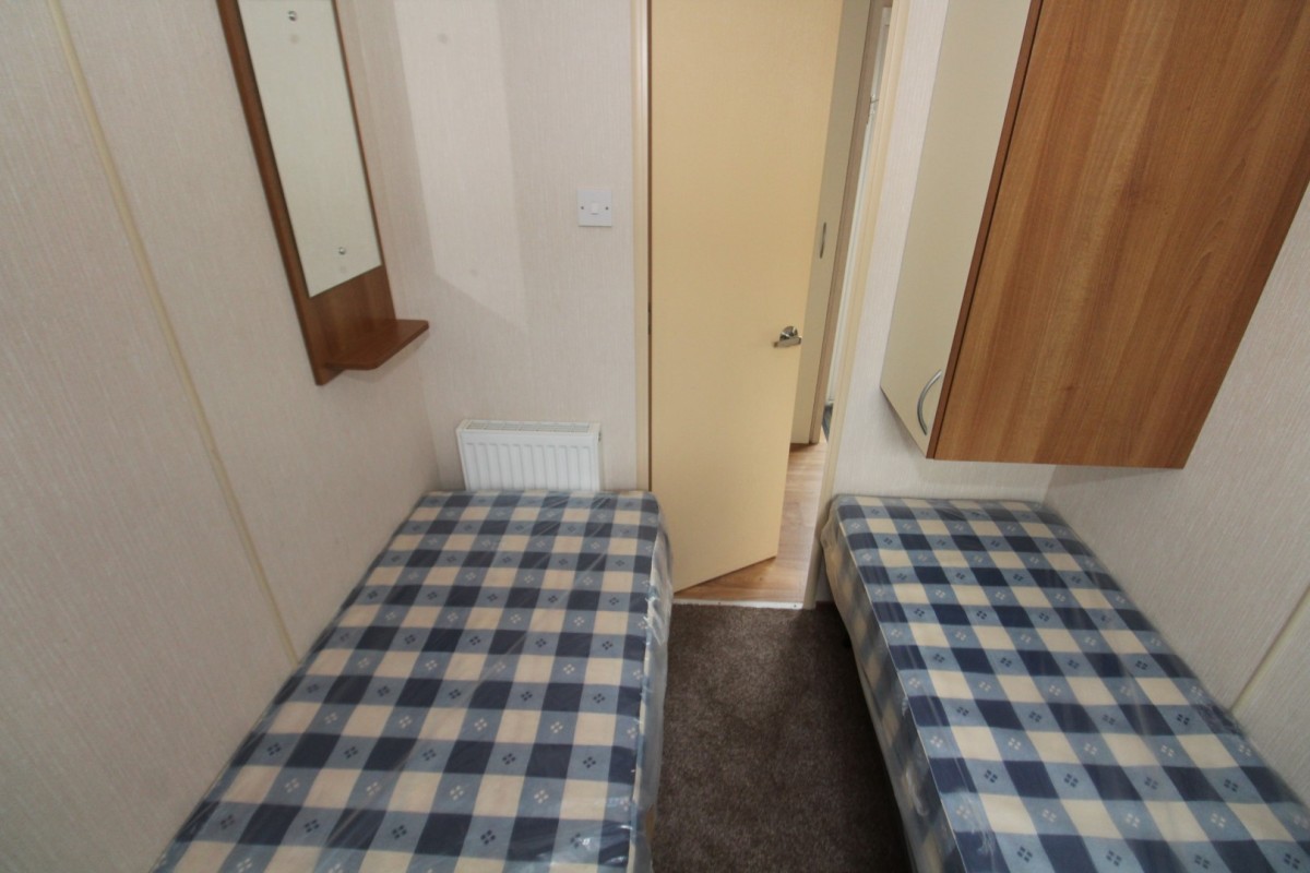 twin bedroom with doors