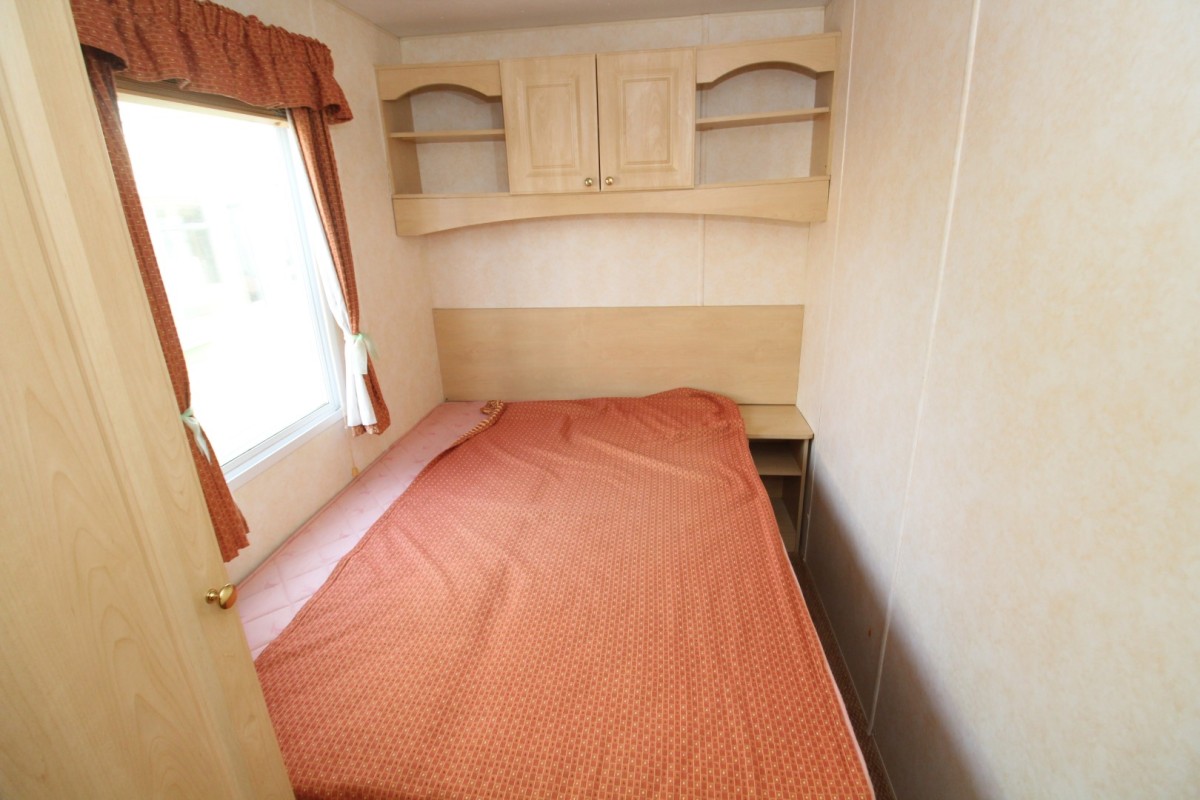 double bed by the windows
