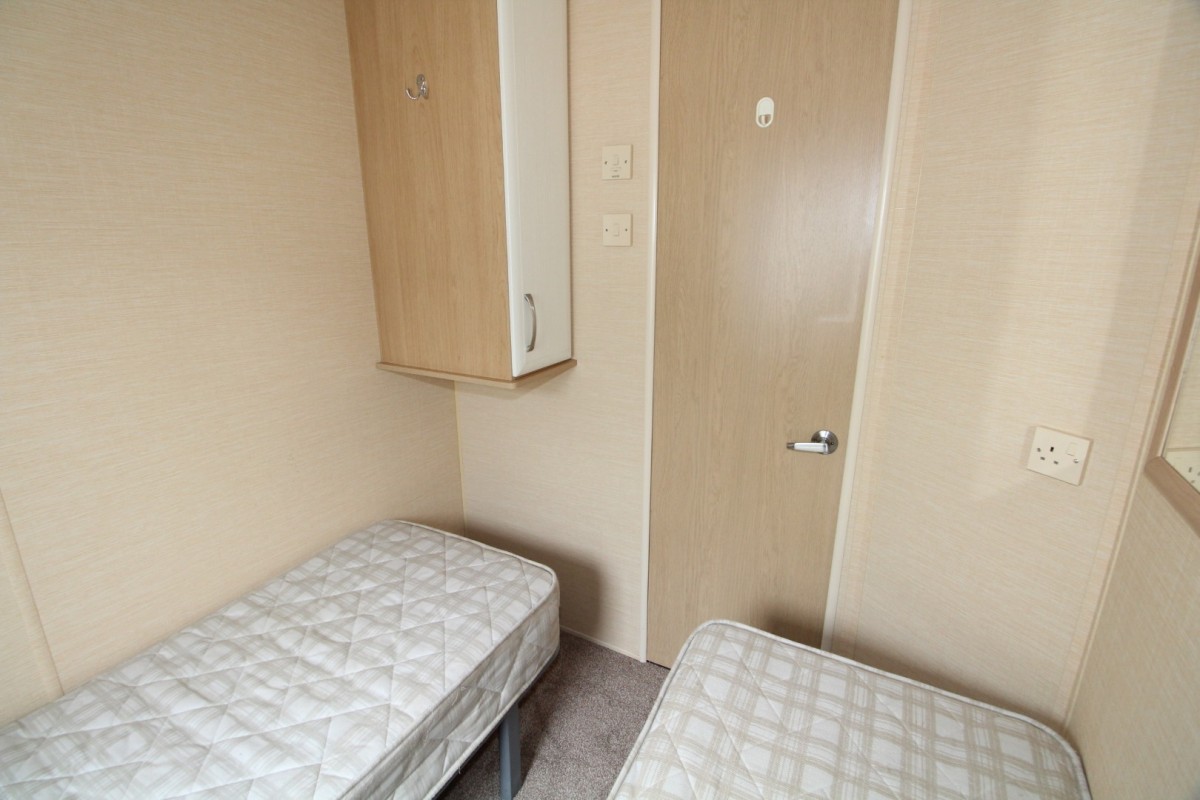 second view of twin bedroom