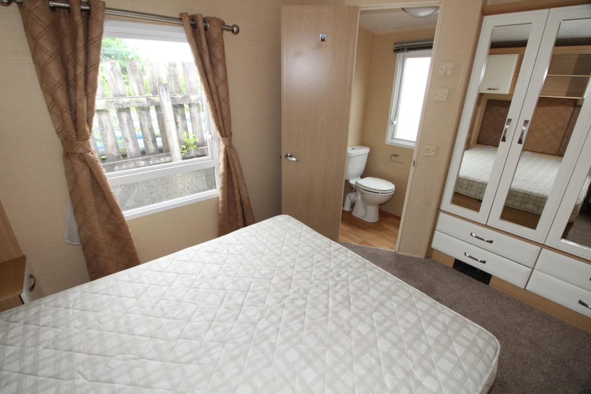 double bedroom to en-suite bathroom in the 2010 Willerby Granada