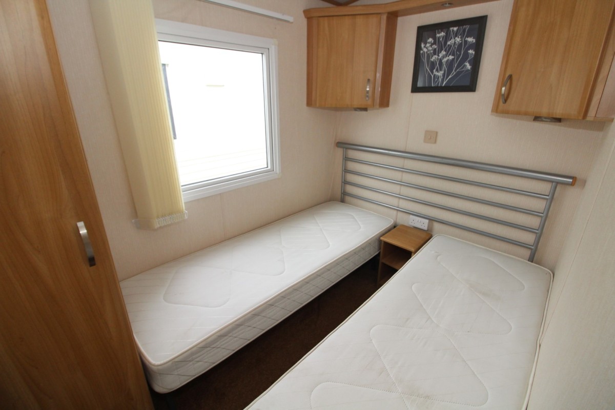 third bedroom with wardrobes