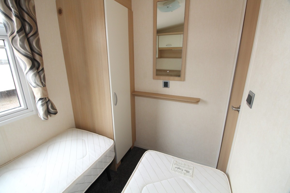 twin beds in the third bedroom