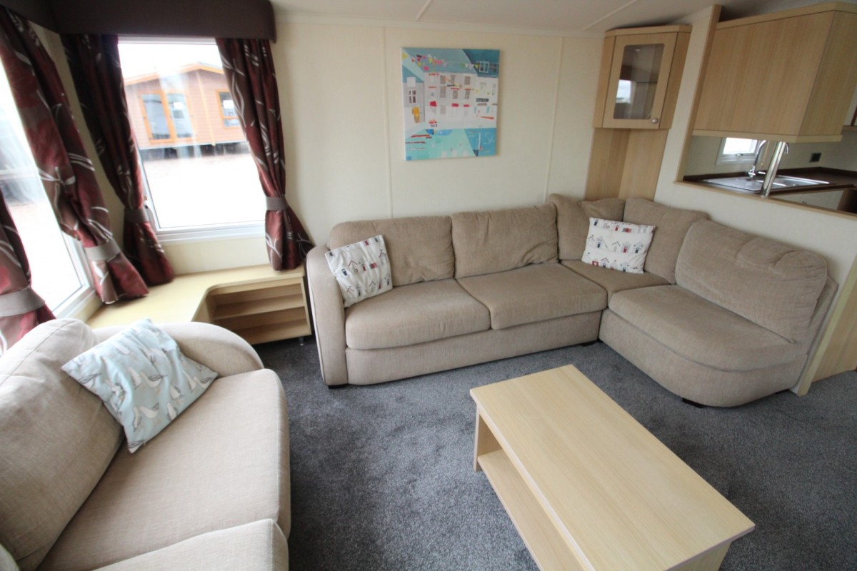 lounge with sofas and fire in the 2011 Swift Moselle