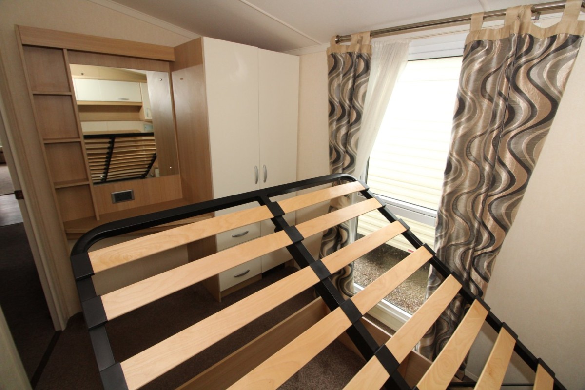 lift up bed with storage space under in the 2011 Swift Moselle
