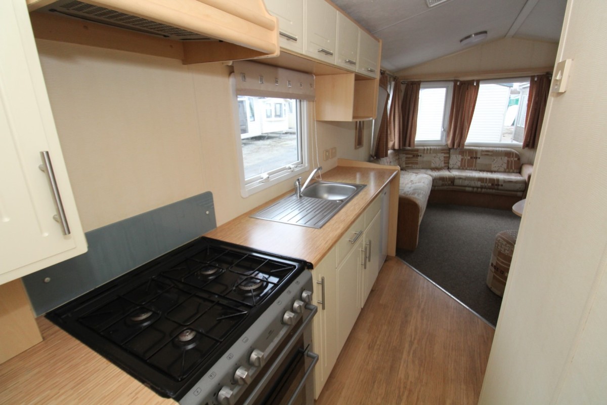 cooker and sink in kitchen