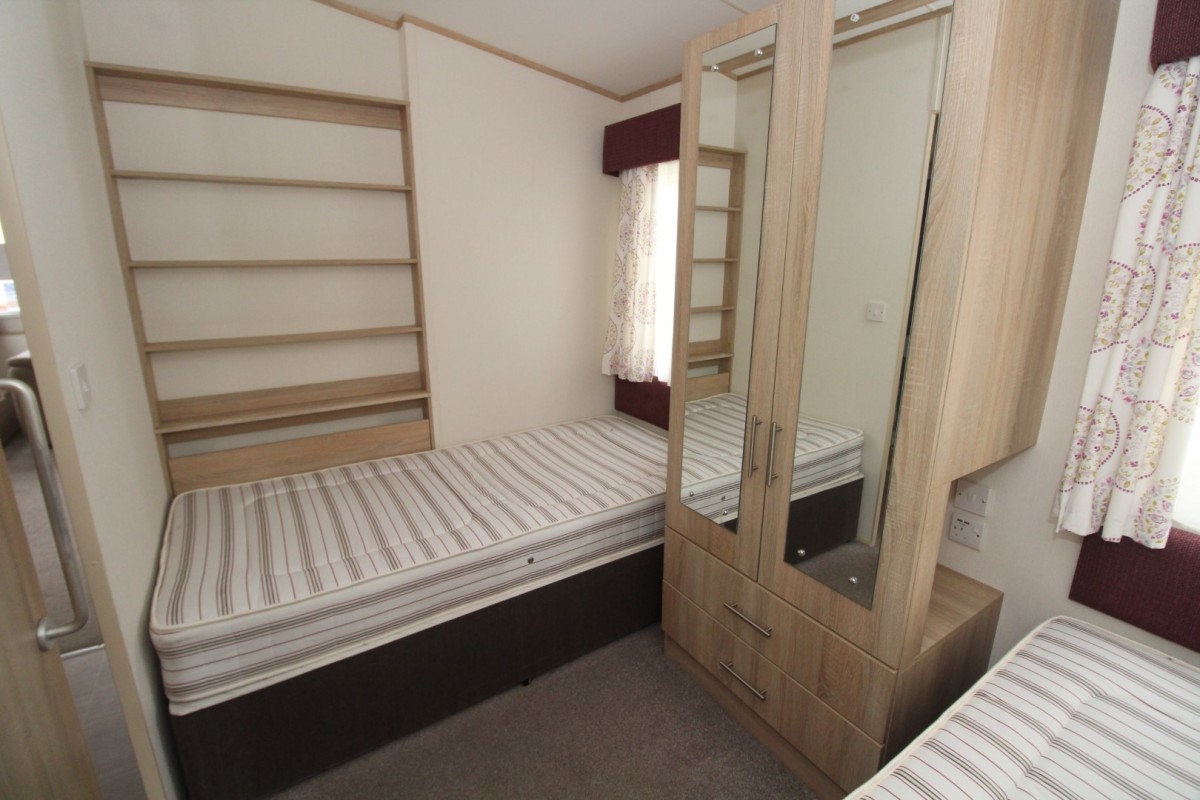 twin bedroom with wardrobe