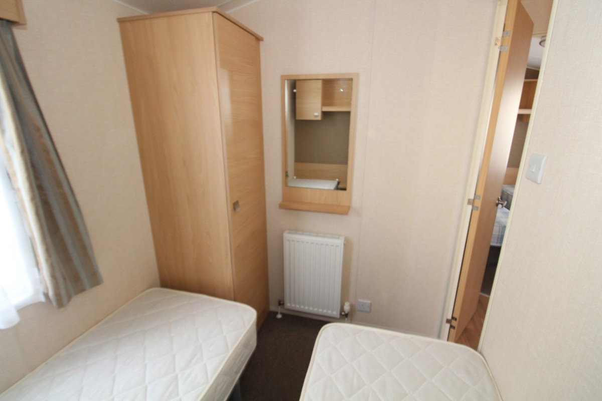third bedroom with wardrobe