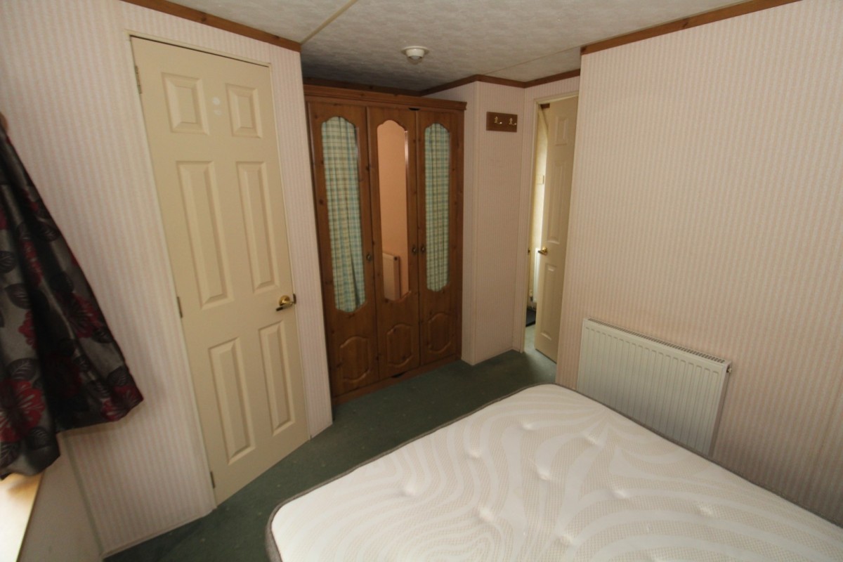 double bedroom with wardrobes
