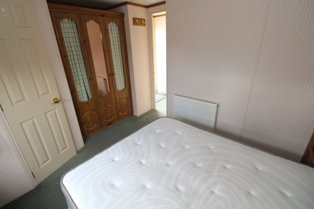 2002 Willerby Manor doub;e bedroom with wardrobes