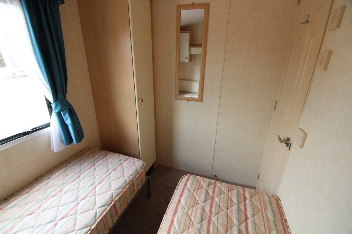 second view of twin bedroom