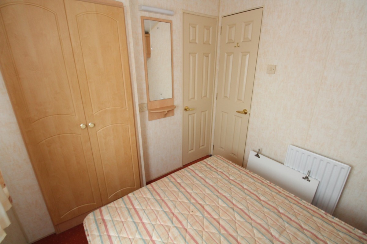 double bedroom with wardrobes