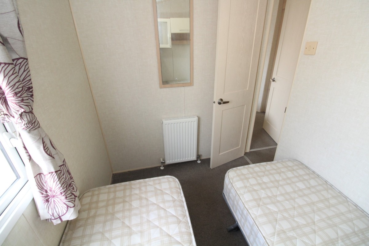 another view of the twin bedroom