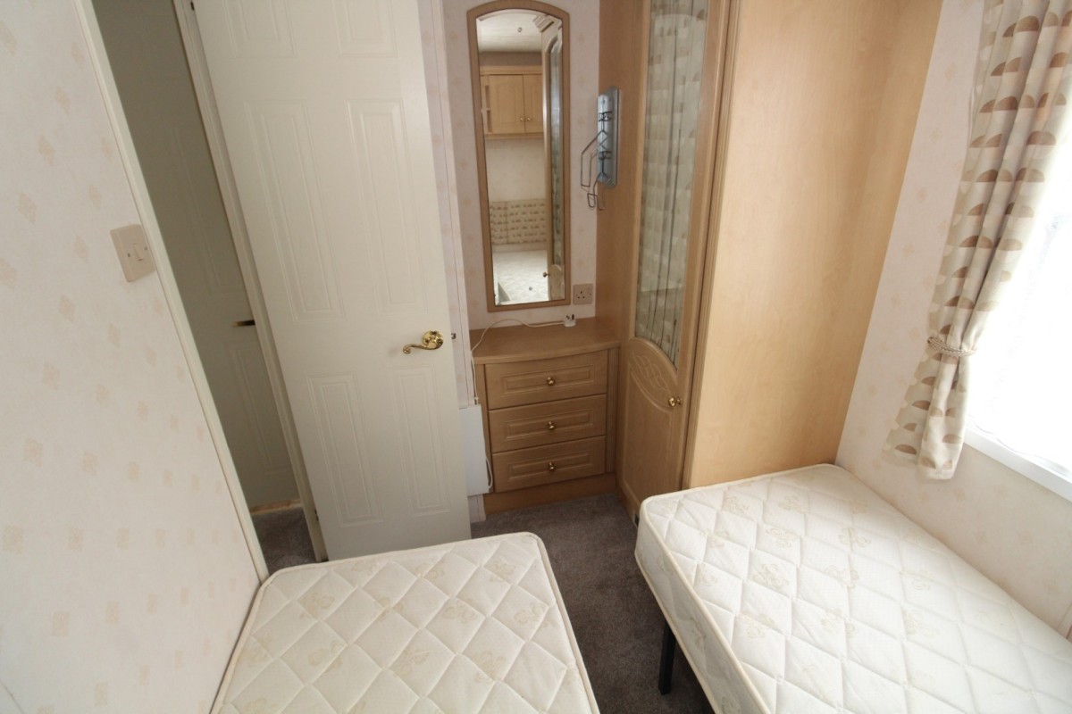 second view of twin bedroom