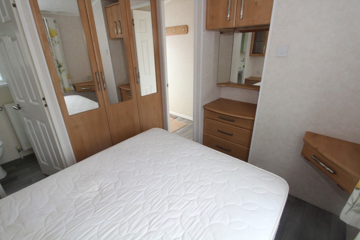 double bedroom with wardrobes