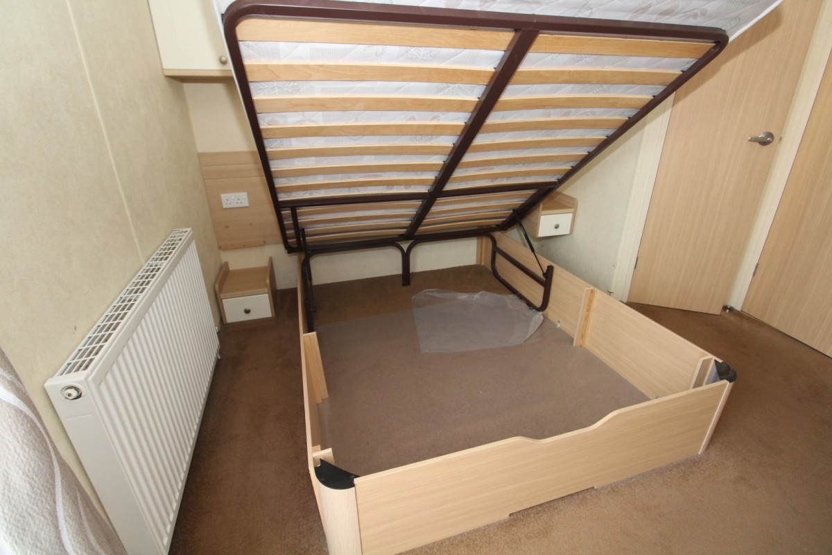lift up bed in the double bedroom