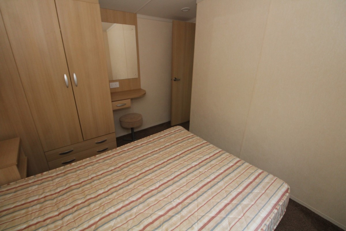 2012 Swift Burgundy double bed with wardrobe