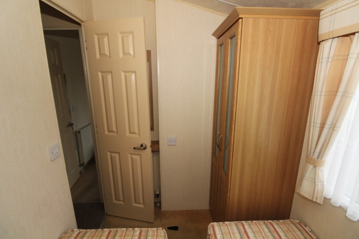 second view of twin bedroom